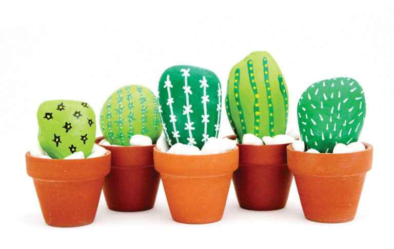 rocks painted like green cactus in a small terracotta pot