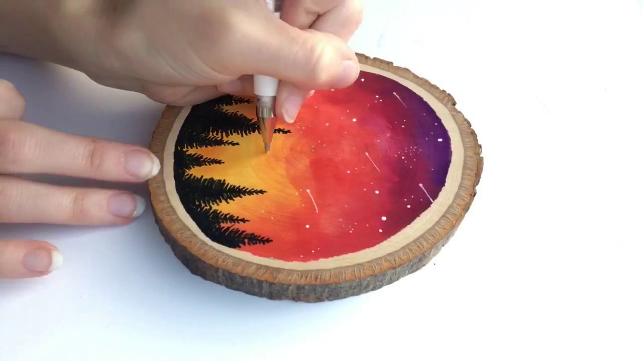 sunset painting on wood slice