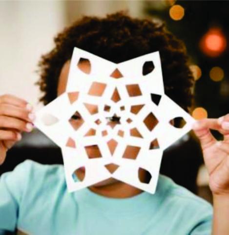 Kid making snowflake