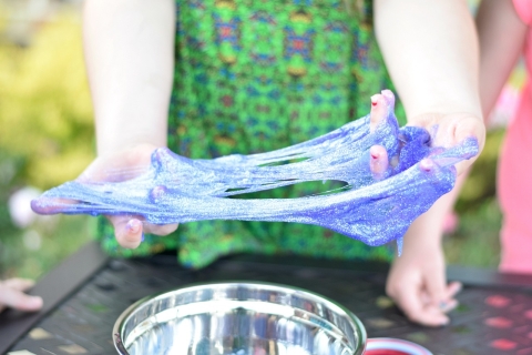 Hands pulling slime.