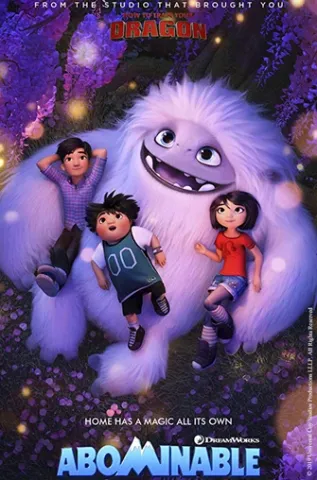 A yeti sitting with three children.