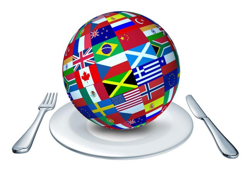 Globe with flags on plate